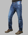 Blue jeans worn by a person on a gray background