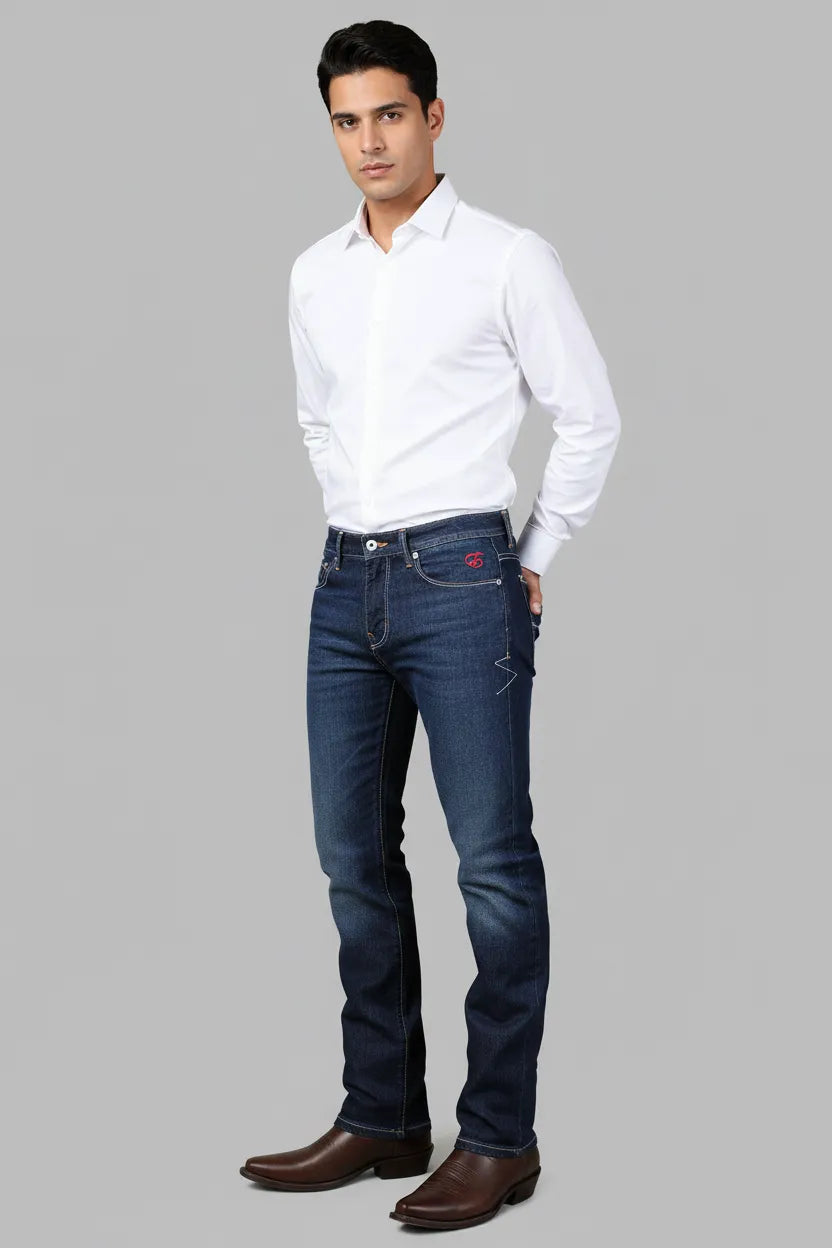 Man wearing a white shirt, blue jeans, and a red bandana on a gray background