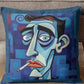 Decorative pillow with abstract face design on a couch