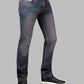 Dark blue jeans worn by a person on a gray background