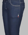 Navy blue jeans on a gray background
