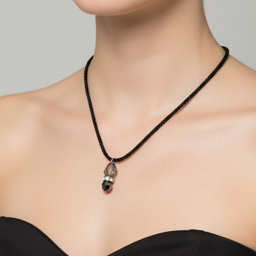 Necklace with a pendant on a dark surface