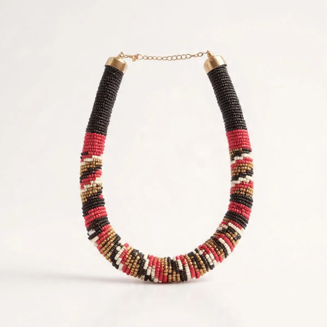 Multicolored beaded necklace on a white background