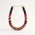 Multicolored beaded necklace on a white background