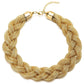 Gold braided necklace on a white background