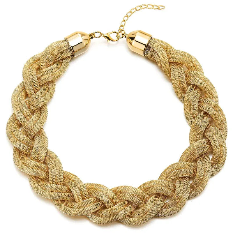 Gold braided necklace on a white background