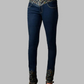 Dark blue jeans with decorative elements on a gray background