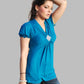Turquoise cap sleeve knit top with brooch