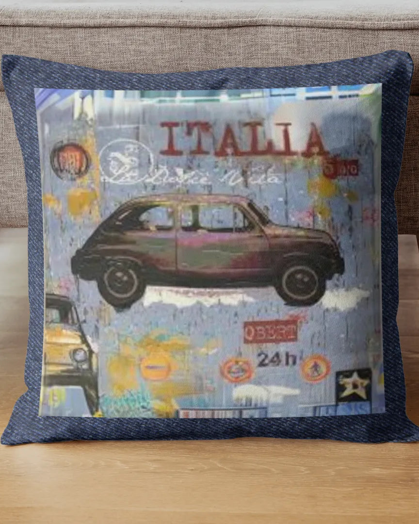 Decorative pillow with Italian-themed design featuring a car and 'Italia' text on a couch.