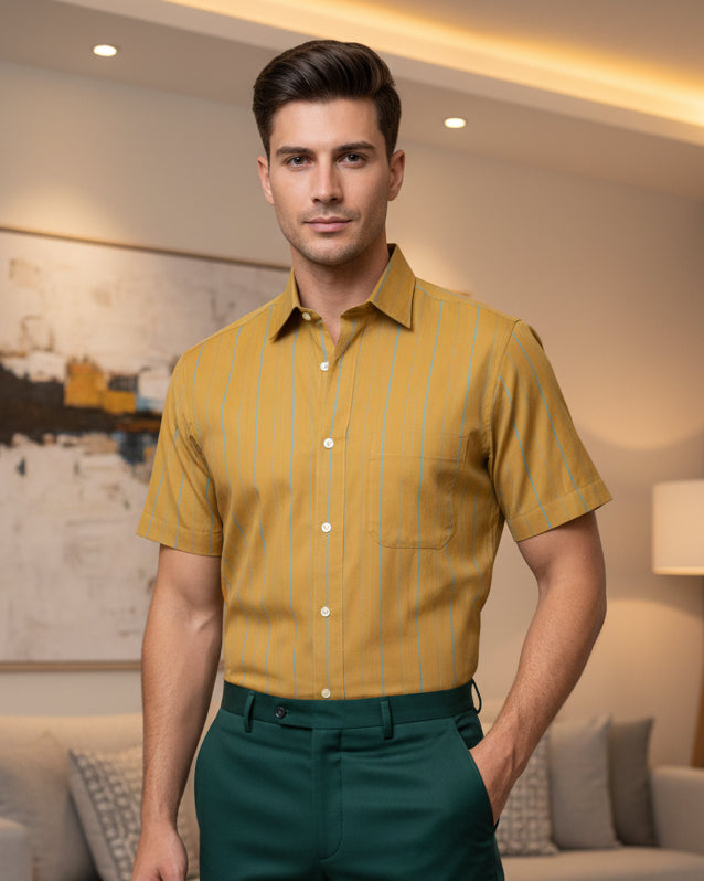 A short-sleeve button-up shirt in mustard yellow with thin vertical  green stripes 