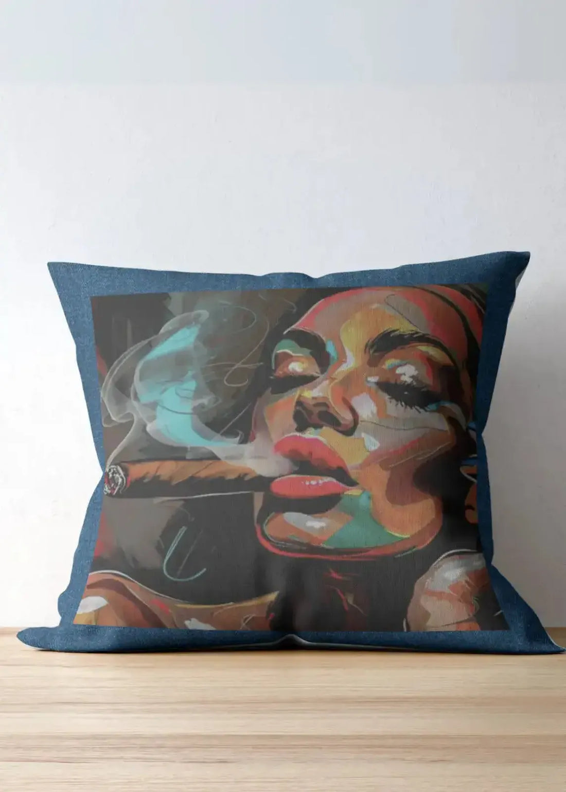 Decorative pillow with a colorful face design on a couch.