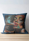 Decorative pillow with a colorful face design on a wooden surface