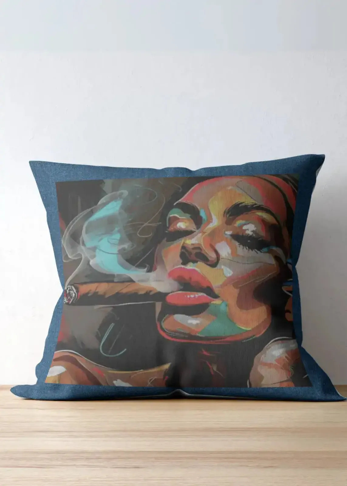 Decorative pillow with a colorful face design on a wooden surface