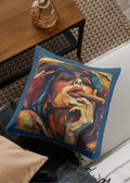 Colorful pillow with a artistic depiction of a person smoking on a couch.
