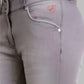 Gray riding pants with a brand logo on a light gray background