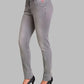 Gray pants worn by a person on a gray background
