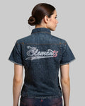 Person wearing a denim shirt with 'Element' branding on the back against a neutral background
