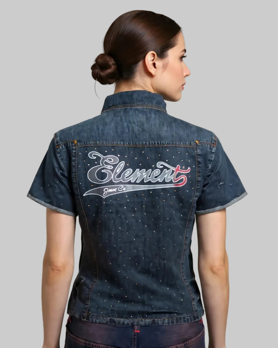 Person wearing a denim shirt with 'Element' branding on the back against a neutral background