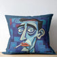 Decorative pillow with a stylized face design on a wooden surface