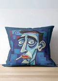 Decorative pillow with a stylized face design on a wooden surface