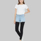 Woman wearing a white t-shirt, light blue denim shorts, and black leggings on a white background