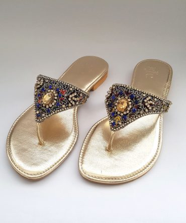 Golden flat slippers with multi-colour stone embellishment